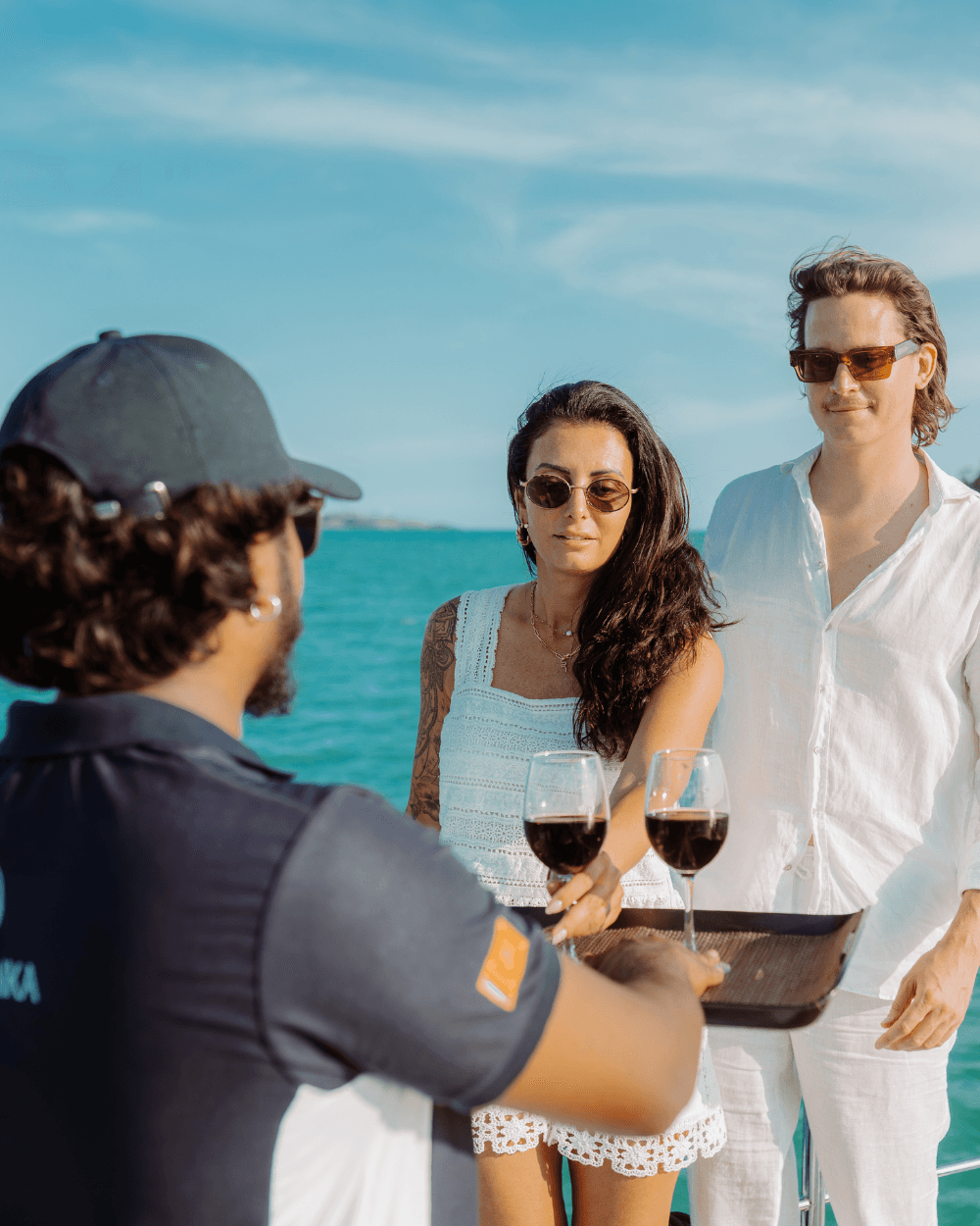 Guests being hosted on the deck of a Sail Lanka vessel